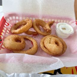 $3.99 onion rings that look like someone was still hungry in the back.