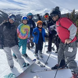 Happy Sport Ski Rental - Group photo at the top of ski Loveland