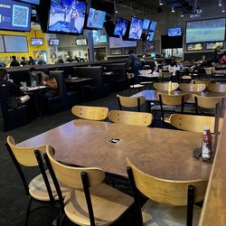 Buffalo Wild Wings - Nobody seems concerned about cleaning off booths and tables...