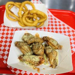 Texas Wings and Grill - Spicy lemon pepper wings with onion rings combo
