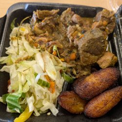 Fi Mi Pot - Curried goat with cabbage and plantains. Watch out for bone shards in the perfectly tender meat.