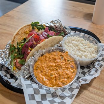 Pita Press - My made to order pita with Jasmine rice and an app sized portion of feta frenzy dip - Mediterranean Near Me - Greensboro, North Carolina Pita Press - My made to order pita with Jasmine rice and an app sized portion of feta frenzy dip - Mediterranean Near Me - Greensboro, North Carolina