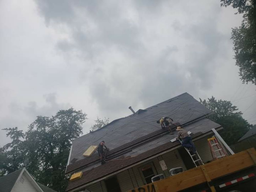 Slide of J&K Roofing Company