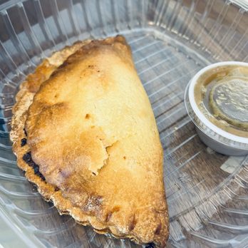 Sticky Fingers Cafe - Empanada (with a side of salsa) - Bakeries Near Me - Lago Vista, Texas Sticky Fingers Cafe - Empanada (with a side of salsa) - Bakeries Near Me - Lago Vista, Texas