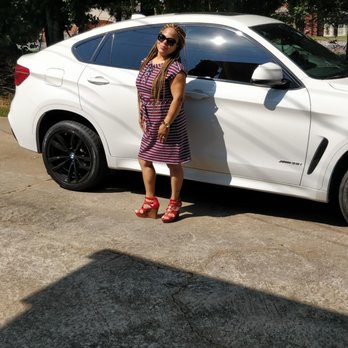BMW of Akron - White exterior with the black wheels and red inside - Car Dealers Near Me - Akron, Ohio
