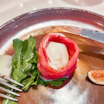 Spago - Prosciutto di Parma, Buratta Cheese, D'Anjou Pear, Honey-Lime Vinaigrette, Aged Balsamic - New American Near Me - Las Vegas, Nevada Spago - Prosciutto di Parma, Buratta Cheese, D'Anjou Pear, Honey-Lime Vinaigrette, Aged Balsamic - New American Near Me - Las Vegas, Nevada