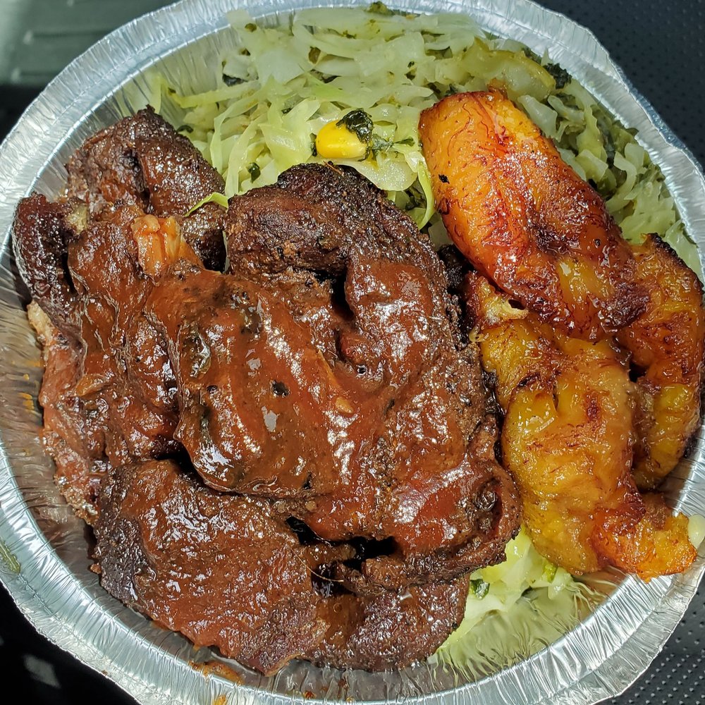 Tropical Rhythm - Jerk pork with cabbage and the sweetest plantains ever. Loved the island sauce on the pork! - Caribbean Near Me - Brandon, Florida Tropical Rhythm - Jerk pork with cabbage and the sweetest plantains ever. Loved the island sauce on the pork! - Caribbean Near Me - Brandon, Florida