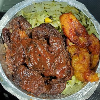 Tropical Rhythm - Jerk pork with cabbage and the sweetest plantains ever. Loved the island sauce on the pork! - Caribbean Near Me - Brandon, Florida