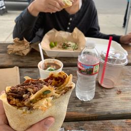 a child eating a burrito