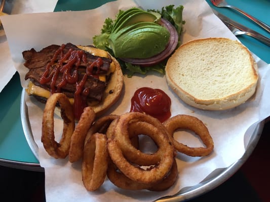 Photo of Burger Joint - San Francisco, CA, US. Cheese burger with bacon, avocado and onion rings.