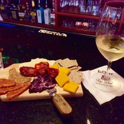 Top Hat - Charcuterie board with a glass of white wine. A perfect light dinner!