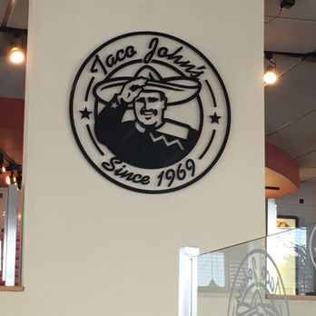 Taco John's - a sign in a restaurant - Mexican Near Me - Dickinson, North Dakota Taco John's - a sign in a restaurant - Mexican Near Me - Dickinson, North Dakota