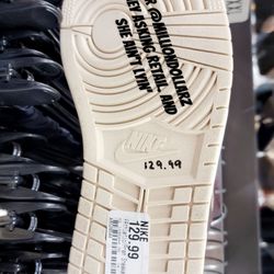 Uptown Cheapskate - Arlington - Second-hand store selling used shoes at retail prices.  Taken 02.03.25