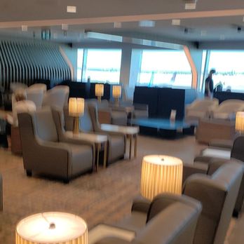 Plaza Premium Lounge - Spacious and comfortable chairs and tables with electrical outlets to plug in all your devices - Airport Lounges Near Me Plaza Premium Lounge - Spacious and comfortable chairs and tables with electrical outlets to plug in all your devices - Airport Lounges Near Me