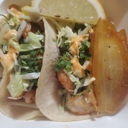 2 shrimp tacos with grilled onion