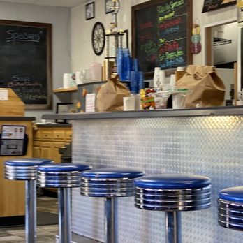 The Blackstone - a row of blue stools in a diner - Breakfast & Brunch Near Me - Green Bay, Wisconsin The Blackstone - a row of blue stools in a diner - Breakfast & Brunch Near Me - Green Bay, Wisconsin