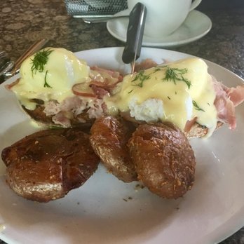 Lola - eggs benedicts with garlic fried potatoes - Greek Near Me - Seattle, Washington Lola - eggs benedicts with garlic fried potatoes - Greek Near Me - Seattle, Washington