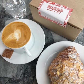Beaucoup Bakery & Cafe - Almond croissant, latte with nuez almond milk! In the box pumpkin gateau, kouign aman, brownie, and tropical scone. - Bakeries Near Me - Vancouver, British Columbia