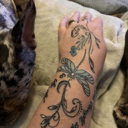 Hand tattoo by Ellie 7/2026.