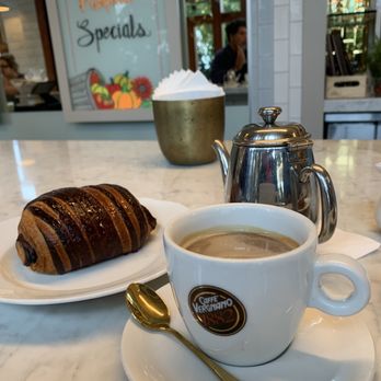 Bianca - Americano from Caffe' Vergnano served with hot water on the side and chocolate croissant. - French Near Me - Culver City, California Bianca - Americano from Caffe' Vergnano served with hot water on the side and chocolate croissant. - French Near Me - Culver City, California