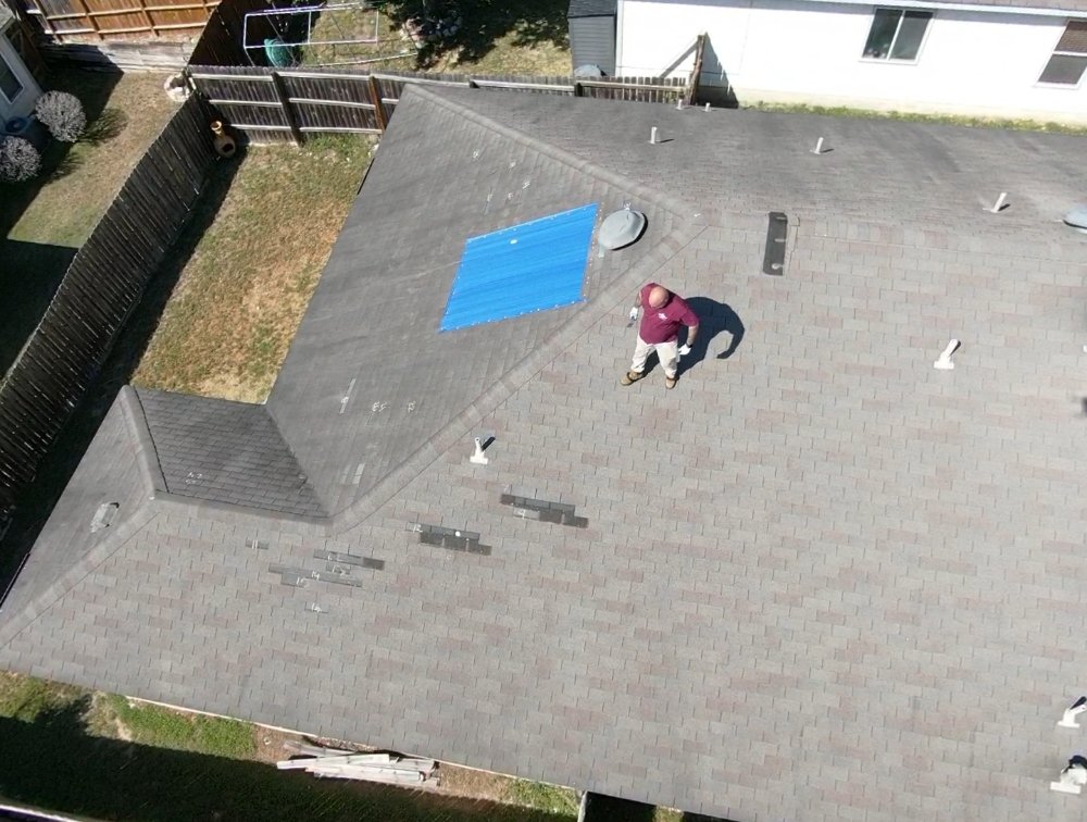 Slide of Reveille Roofing