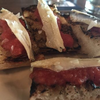 Poor Hendrix - Tomato garlic bread with anchovy - New American Near Me - Atlanta, Georgia Poor Hendrix - Tomato garlic bread with anchovy - New American Near Me - Atlanta, Georgia