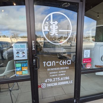 Tan-Cha - Outside. Storefront. Front door. Business hours and business info. Phone number, Instagram handle. - Bubble Tea Near Me - Doraville, Georgia