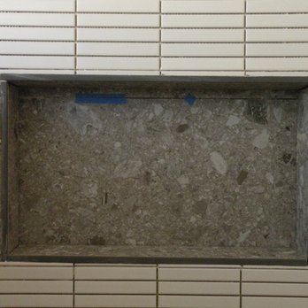 Larsen Stone & Tile - Bathroom Niche: see the crooked tiny odd shaped tile pieces b/c he didn't plan the tile layout before making the niche - General Contractors Near Me Larsen Stone & Tile - Bathroom Niche: see the crooked tiny odd shaped tile pieces b/c he didn't plan the tile layout before making the niche - General Contractors Near Me