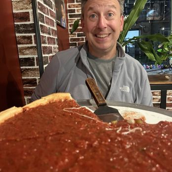Ang an Eddies - Chicago style deep dish with my cutie patootie hubs. - Pizza Near Me - Fond du Lac, Wisconsin