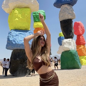 Seven Magic Mountains - Pose idea: Casually shading your eyes - Public Art Near Me - Las Vegas, Nevada Seven Magic Mountains - Pose idea: Casually shading your eyes - Public Art Near Me - Las Vegas, Nevada