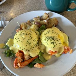 Lobster Eggs Benedict and home fries Lobster Eggs Benedict and home fries