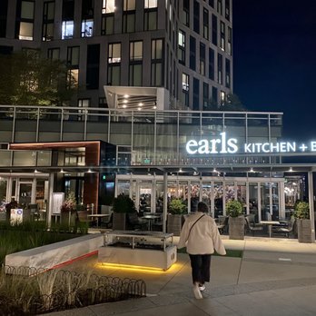 Earls Kitchen + Bar - Outside of restaurant - approaching from the plaza level connecting Tysons Corner Mall to the restaurant and office building - New American Near Me - McLean, Virginia Earls Kitchen + Bar - Outside of restaurant - approaching from the plaza level connecting Tysons Corner Mall to the restaurant and office building - New American Near Me - McLean, Virginia