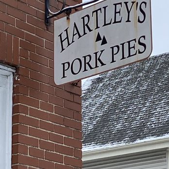Hartley's Pork Pie - a sign on a brick building - Bakeries Near Me - Lincoln, Rhode Island Hartley's Pork Pie - a sign on a brick building - Bakeries Near Me - Lincoln, Rhode Island