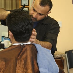 Eddie's Hair Salon - Eddie at work