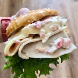 Pretzel Stop - NEW limited time only menu item! Roasted turkey, Swiss cheese, leaf lettuce, tomato, and chunky cranberry Mayo.
