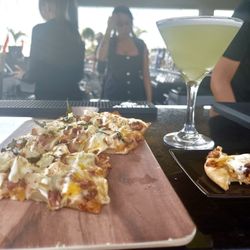 Citrus Sky Bar - Oooey gooey chicken and cheese flatbread and a sour apple martini