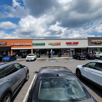 Tropical Smoothie Cafe - View from the parking lot. It is located in a small strip of 6 stores. - Juice Bars & Smoothies Near Me - Clinton, Maryland