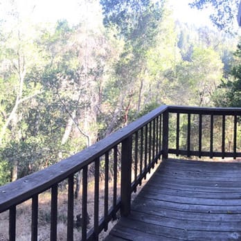 Vajrapani Institute - Panoramic view off the back deck (the deck rail only looks crooked because the picture is panoramic) - Buddhist Temples Near Me - Boulder Creek, California Vajrapani Institute - Panoramic view off the back deck (the deck rail only looks crooked because the picture is panoramic) - Buddhist Temples Near Me - Boulder Creek, California