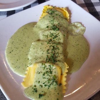 Ippolito's - 5 raviolis in pesto sauce for $13 - Italian Near Me - Suwanee, Georgia Ippolito's - 5 raviolis in pesto sauce for $13 - Italian Near Me - Suwanee, Georgia