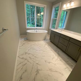 Shine Tile - a large bathroom with a freestanding tub - Flooring Near Me Shine Tile - a large bathroom with a freestanding tub - Flooring Near Me