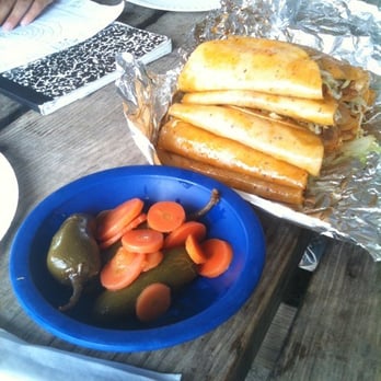 Mota's Tacos - a blue bowl with carrots and pickles - Tacos Near Me - Brownsville, Texas Mota's Tacos - a blue bowl with carrots and pickles - Tacos Near Me - Brownsville, Texas