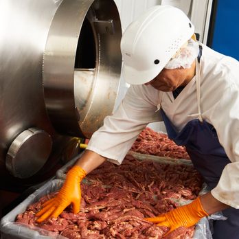 People's Choice Beef Jerky - a man in an industrial kitchen - Meat Shops Near Me - Los Angeles, California People's Choice Beef Jerky - a man in an industrial kitchen - Meat Shops Near Me - Los Angeles, California