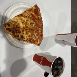 Costco - Cheese pizza slice 1.99 (more like two slices uncut)