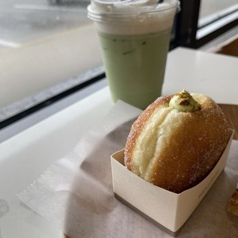 Tous Les Jours - Pistachio cream donut and iced matcha latte - Bakeries Near Me - Jacksonville, Florida