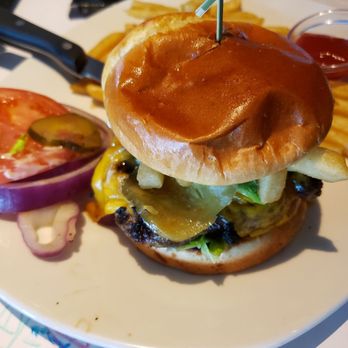 Bonefish Grill - Half-Pound American Kobe Beef Burger- toasted brioche bun, fully dressed with sharp cheddar and special sauce - Seafood Near Me - Orlando, Florida Bonefish Grill - Half-Pound American Kobe Beef Burger- toasted brioche bun, fully dressed with sharp cheddar and special sauce - Seafood Near Me - Orlando, Florida