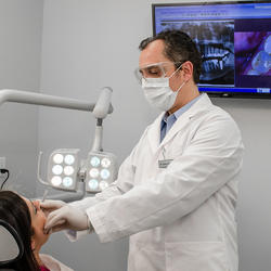 ED Family Dental - Dr. Eduart Shkurti working on a dental patient