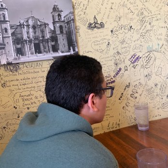 Juana La Cubana Cafe - Checking out the wall - Cuban Near Me - Dania Beach, Florida