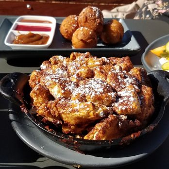 Postino Broadway - Cast Iron Bread and Ricotta Fritters - Wine Bars Near Me - Denver, Colorado Postino Broadway - Cast Iron Bread and Ricotta Fritters - Wine Bars Near Me - Denver, Colorado