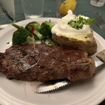 Phil Trani's Restaurant - 9oz. "Prime" New York steak. Came out room temperature at medium well when ordered rare. The best part of the plate was the baked potato. - Music Venues Near Me - Long Beach, California Phil Trani's Restaurant - 9oz. "Prime" New York steak. Came out room temperature at medium well when ordered rare. The best part of the plate was the baked potato. - Music Venues Near Me - Long Beach, California