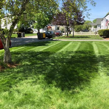 BayState Landscapes & Construction - a red pickup truck parked on a residential street - Landscaping Near Me - Ashland, Massachusetts BayState Landscapes & Construction - a red pickup truck parked on a residential street - Landscaping Near Me - Ashland, Massachusetts